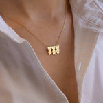 pingente em ouro com dois ou três filhos, menino ou menina, personalizado com nome, inicial e data de nascimento